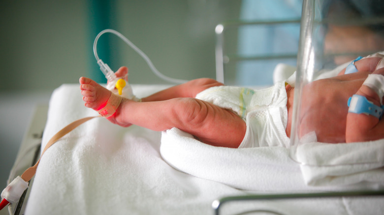 baby in incubator at hospital