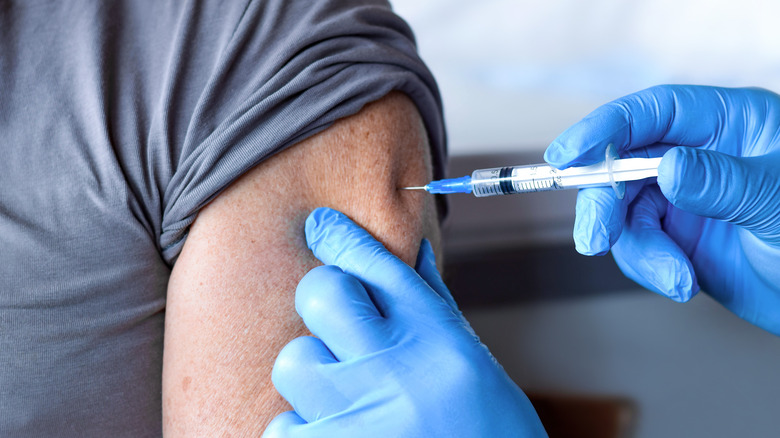 Person receiving vaccine