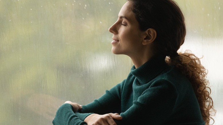 woman enjoying deep breathing