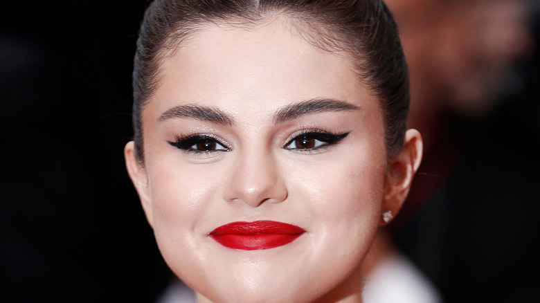 Selena Gomez with red lipstick