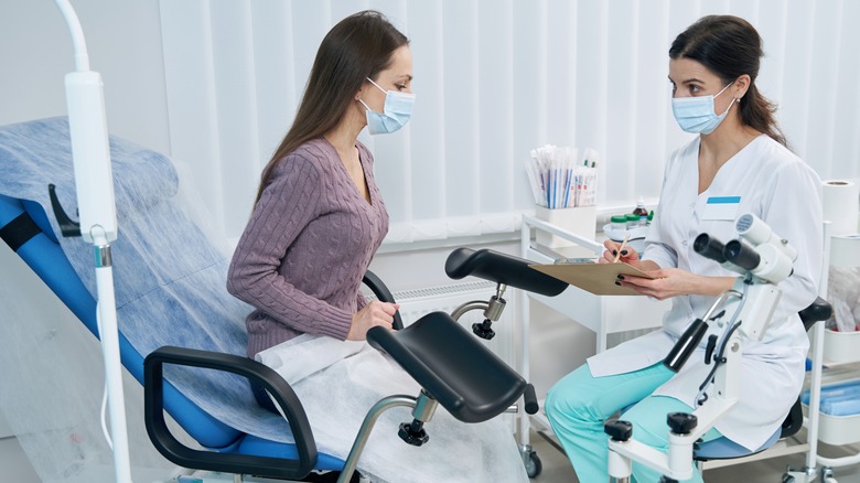 gynecologist speaking with her patient