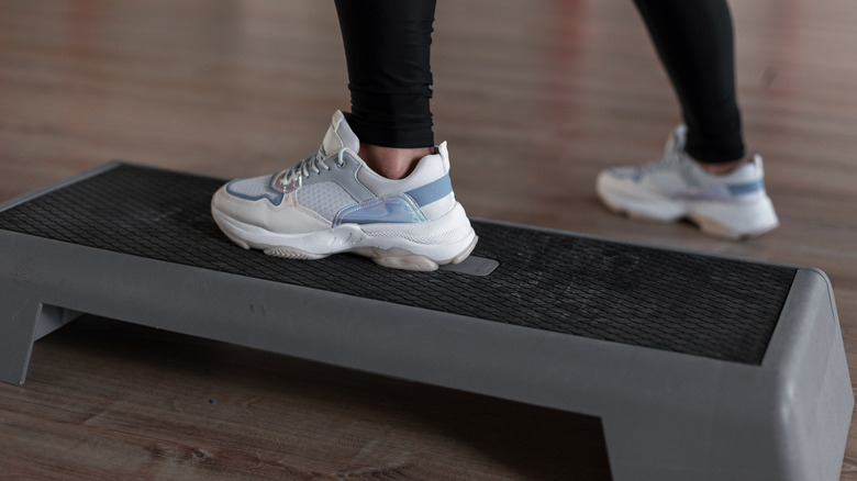 feet on an aerobic step