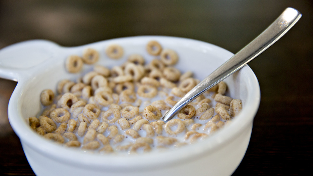 A bowl of cheerios with milk 