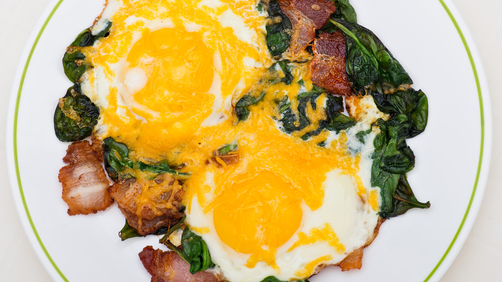 Keto breakfast, eggs, bacon, spinach