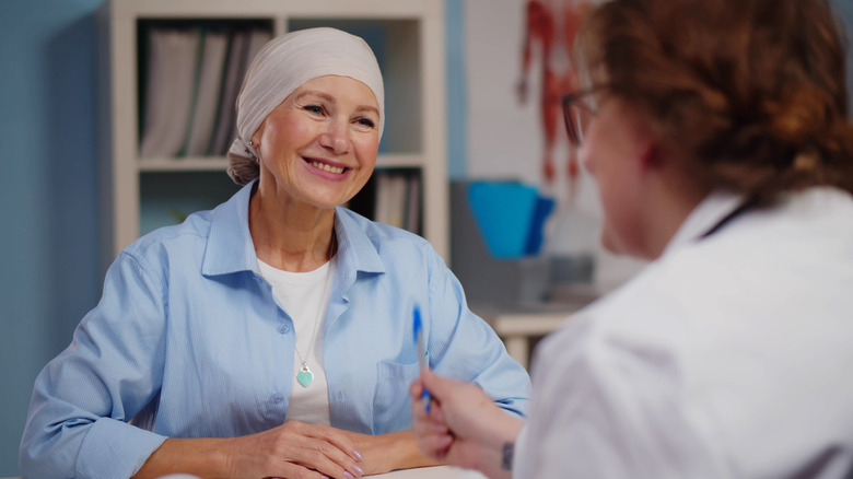 A woman with cancer visiting her doctor