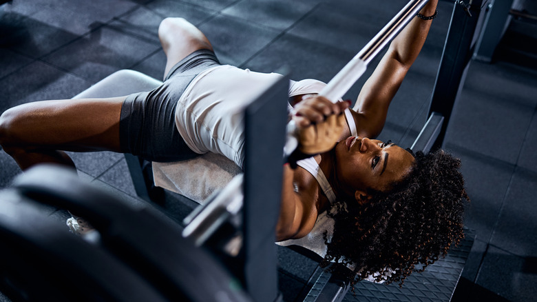 Woman doing a bench press