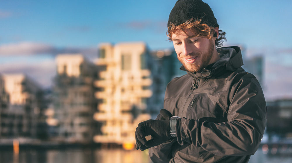 Man jogs outside in cold weather