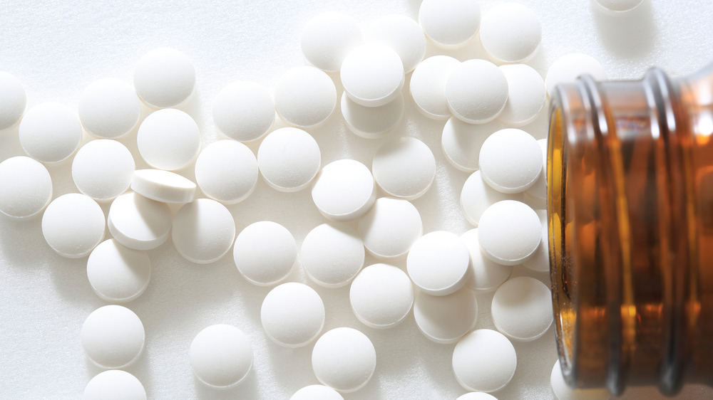 Close up of pills out of bottle