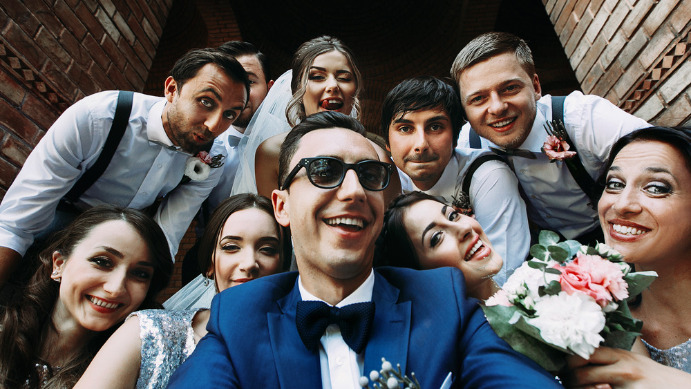 Wedding selfie with bridesmaids & groomsmen