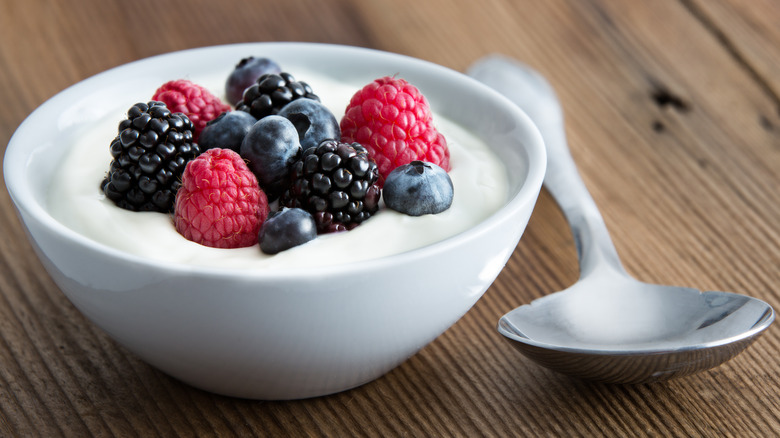 bowl of berries in yogurt