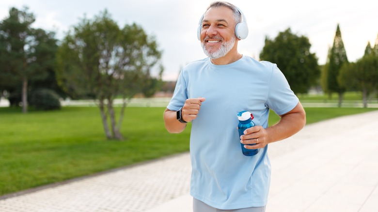 A runner with water bottle