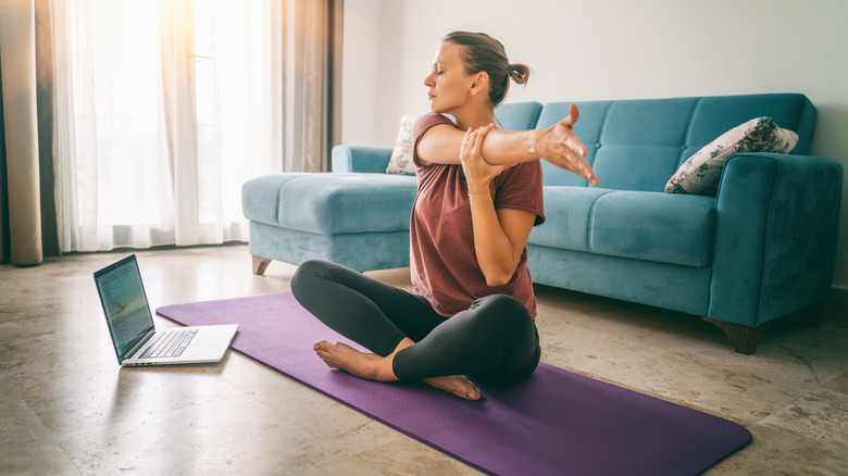 Woman stretching after workout 