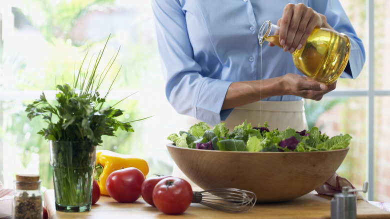 Adding salad dressing