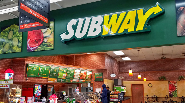 A Subway restaurant inside of a store