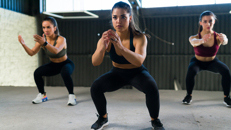 Women doing HIIT at gym