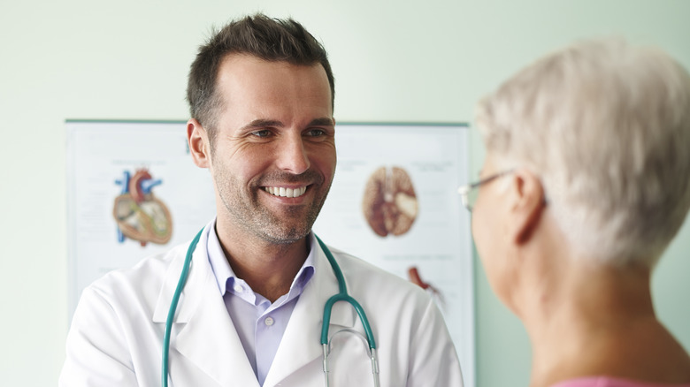 woman discussing with her doctor 