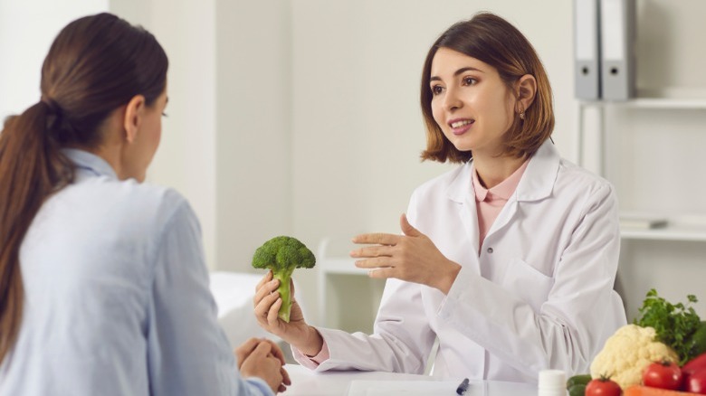 Nutritionist with patient
