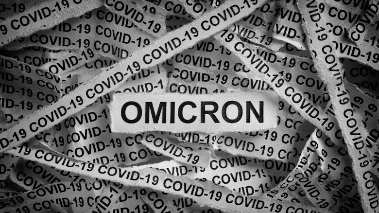 news clippings of COVID headlines 'Omicron'