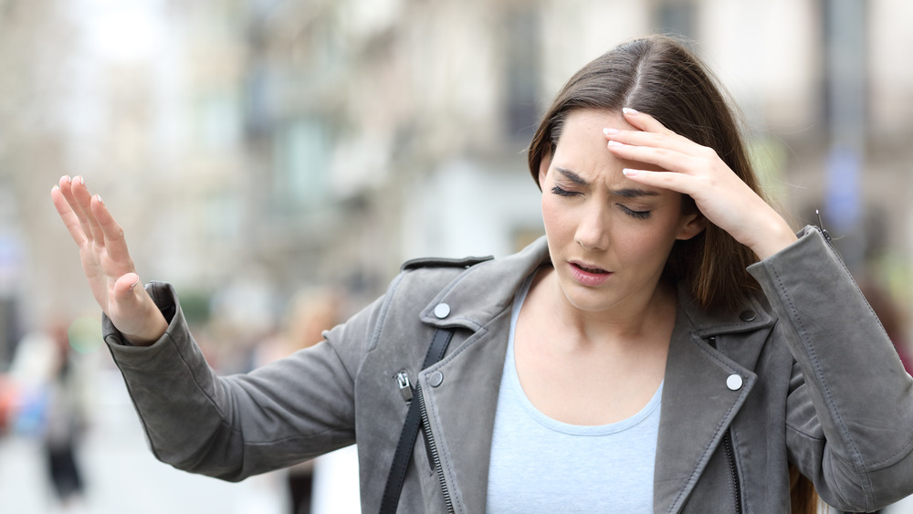 woman feeling faint