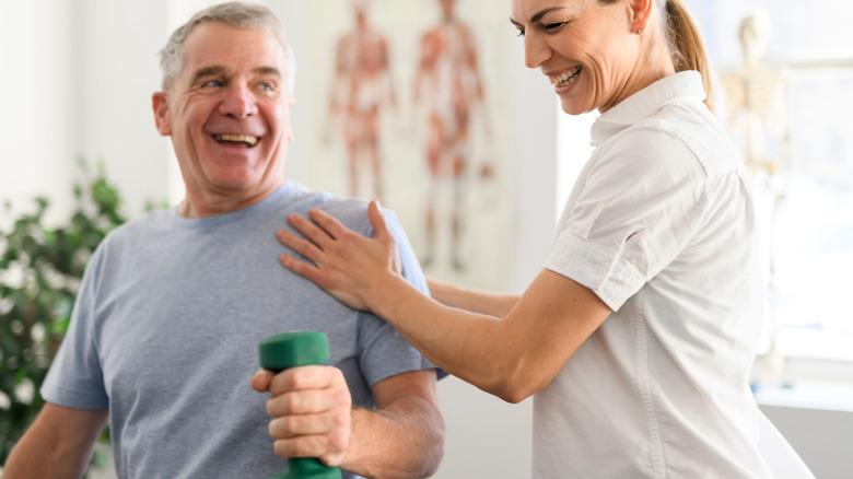 A man undergoing shoulder therapy