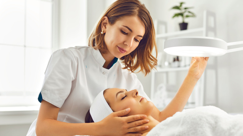 dermatologist with patient