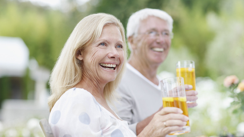 older woman and husband enjoying sweet tea