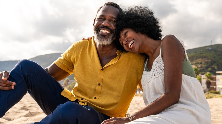 mature woman and man on beach