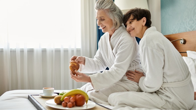 senior lesbian couple embracing