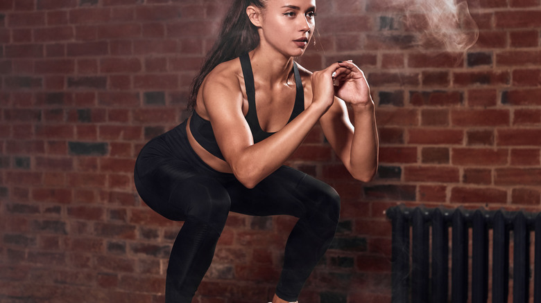 woman doing box jump