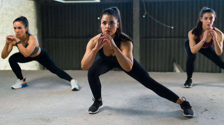 women doing lateral lunges