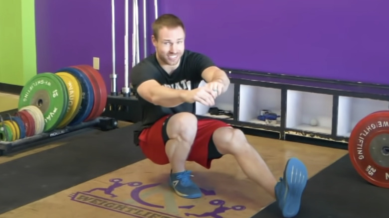 man doing pistol squat