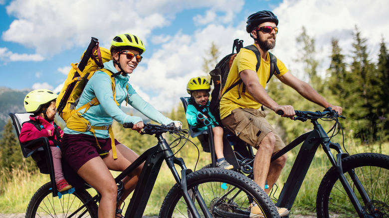 Family cycling together