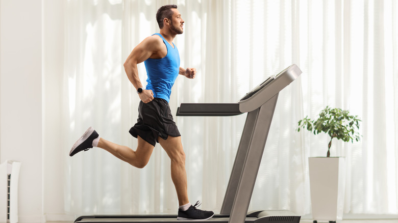 man running on treadmill