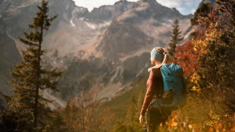 woman with backpack hiking