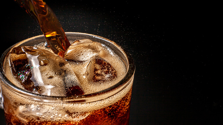 Close-up of a glass of fizzy soda 