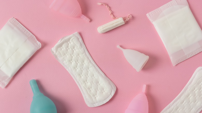 feminine hygiene products on pink surface