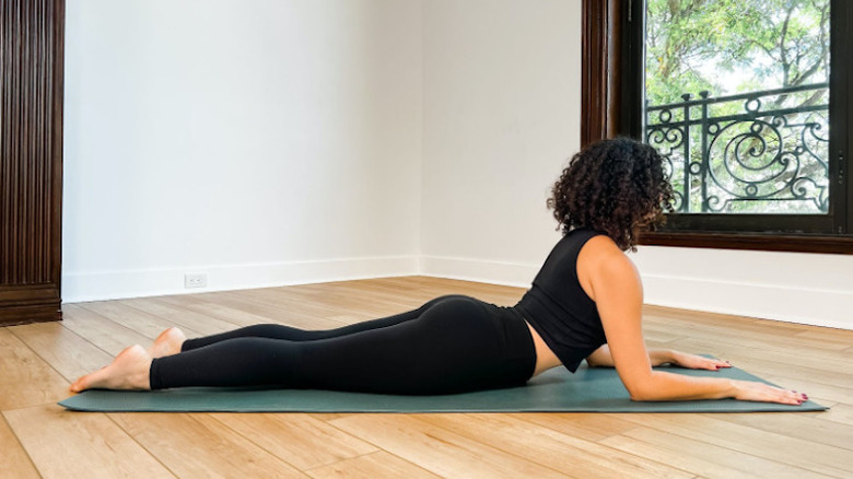 woman doing sphinx pose 