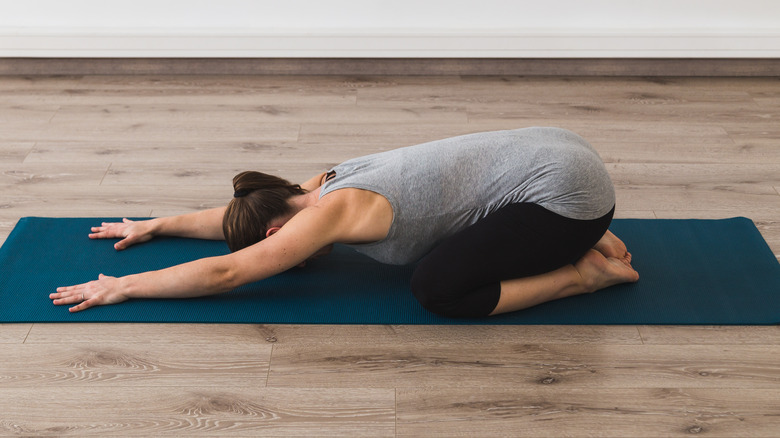 Woman in child's pose