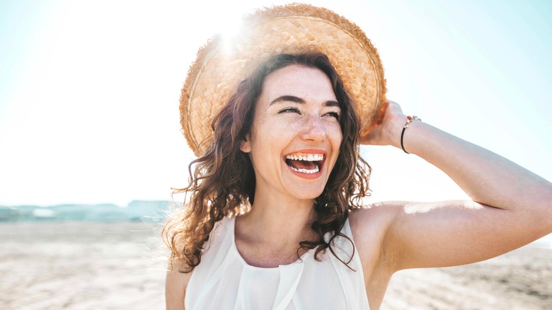 woman wearing a hat outdoors