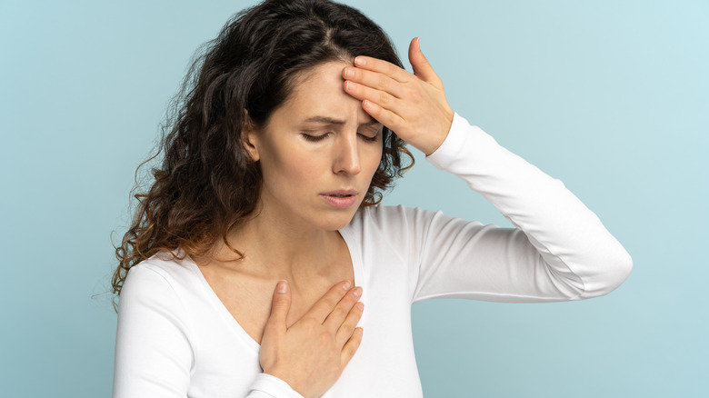 worried woman with fast heart rate