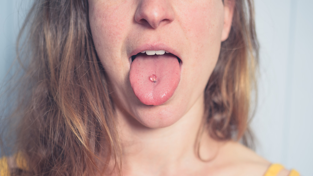 woman with tongue piercing