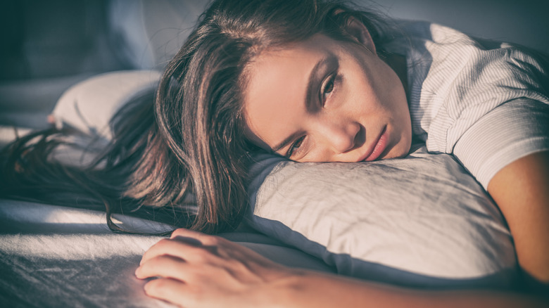 woman in bed with insomnia