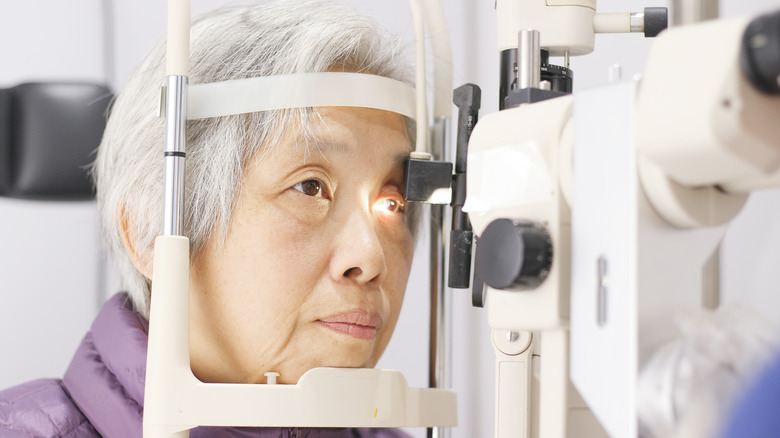 woman getting eye examined