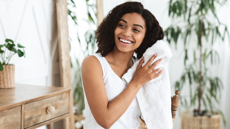 woman with wet hair wrapped in towel