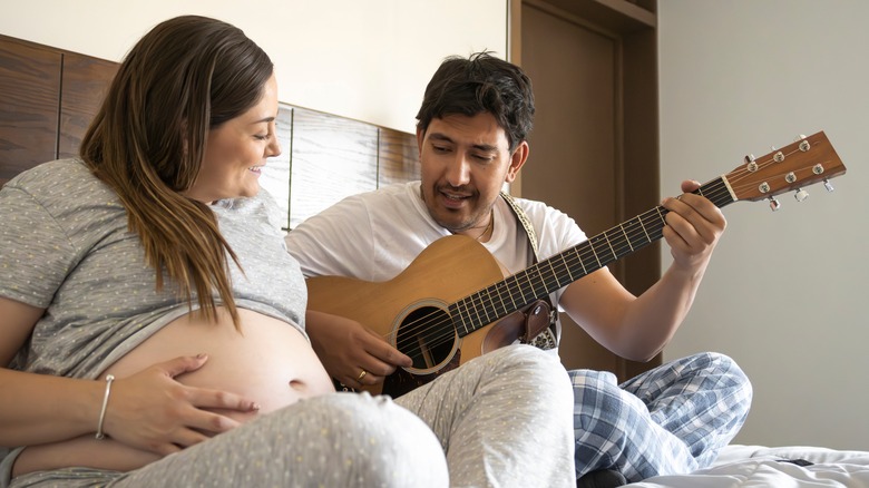 parent singing to unborn child
