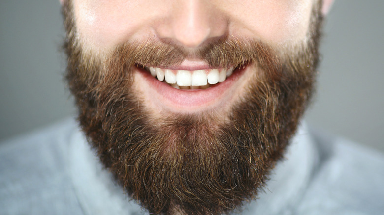 Smiling man with beard