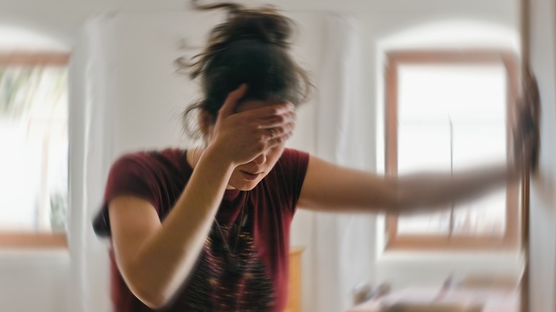 woman suffering from dizziness