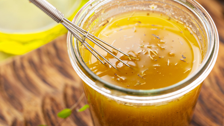 homemade salad dressing with whisk