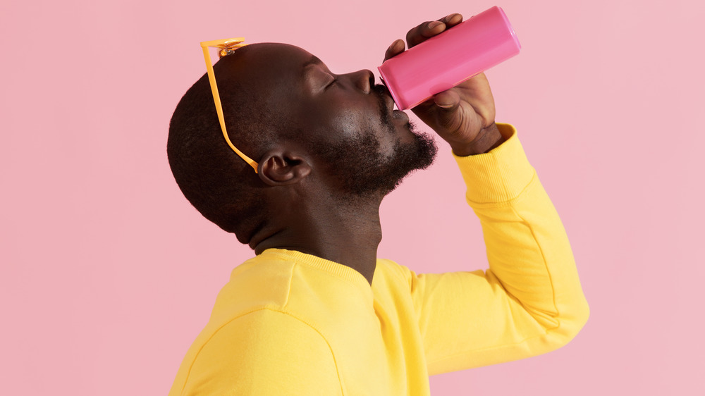 Man drinking energy drink