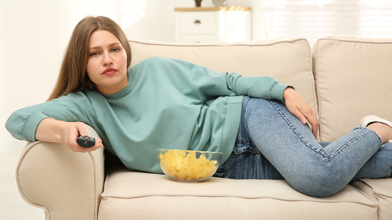 woman being couch potato